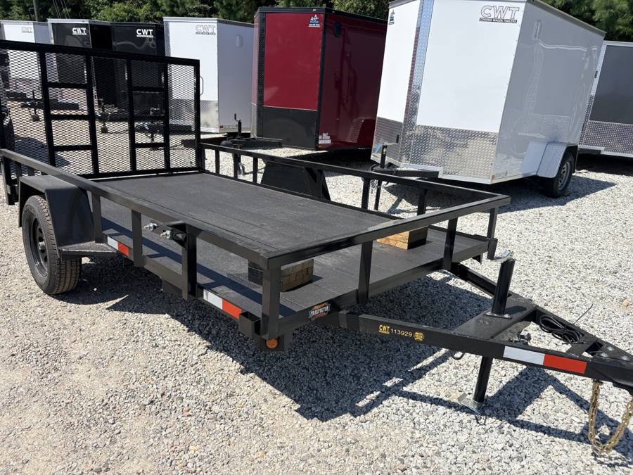 Covered Wagon Prospector wood deck utility trailer with ramp